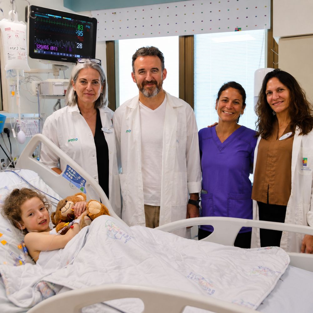 Seven and a half year old Bel Finkelstein meets the family of Capt. Shahar Gamla zl at Clalit Schneider Children's Medical Center in Petah Tikva